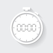 White icon of "Digital stopwatch" in a flat design style isolated on a gray background and with a long shadow effect. Vector Illustration (EPS10, well layered and grouped). Easy to edit, manipulate, resize or colorize. Vector and Jpeg file of different sizes.