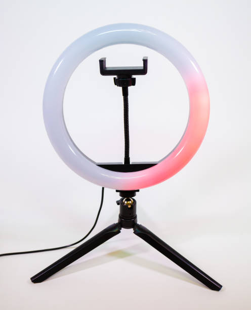 istock Ring lamp on a small tripod. The red light moves in a circle. 1383147095
