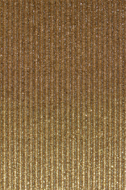 istock Sparkling gold glitter corrugated texture background 1383157091