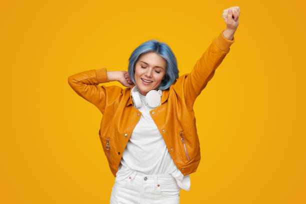 istock Cheerful hipster woman with headphones 1383176508