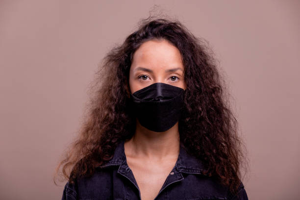 istock Young brazil woman portrait. Protective face mask. 1383220198