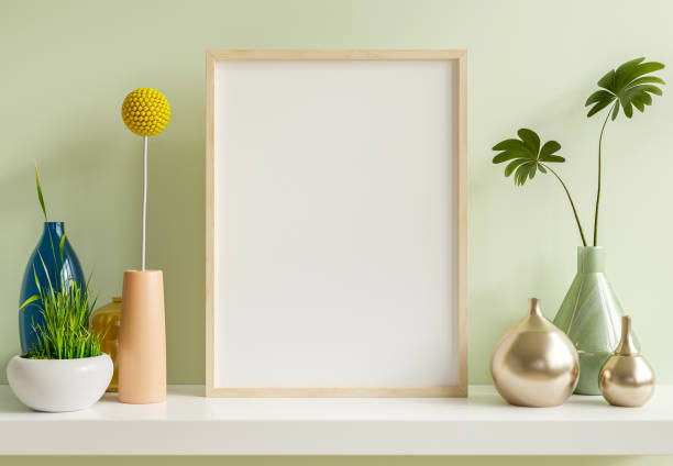 istock Poster mockup with wooden frame in home interior light green background. 1383220402