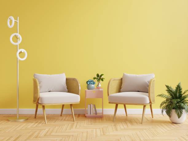 istock Modern living room interior with two armchair and decor on bright yellow wall. 1383220449