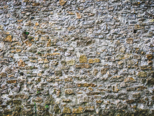 Stone wall as a texture or background. stock photo