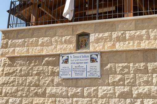 Nazareth, Israel, February 12, 2022 : The fasade of building where lived St. Teresa of kolkata on 6166 street near the Church Of Annunciation in Nazareth, northern Israel