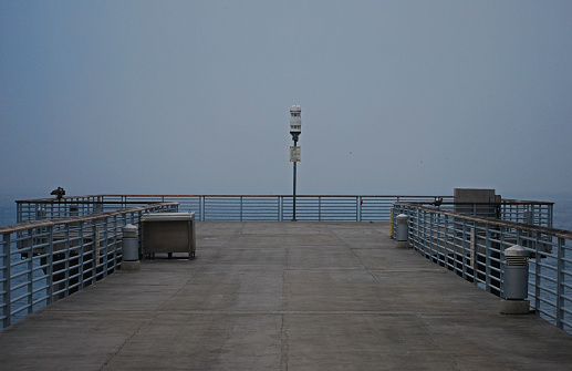 Foggy view at the end of the Hermosa Beach Pier.  Hermosa Beach, CA.