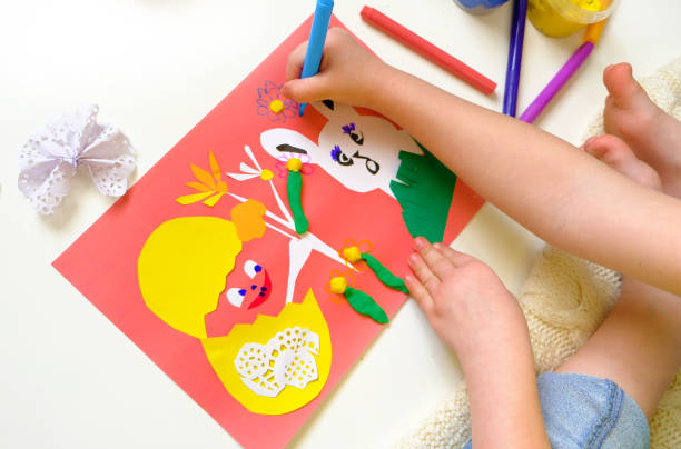 istock DIY Easter home decor from paper and plasticine, Gift ideas, painting Easter card. Handmade.  Childrens Easter crafts. 1383246267