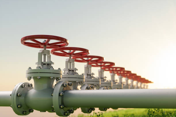 transporte de petróleo, gas o agua con válvulas de tubería en césped. - conrtol valve fotografías e imágenes de stock