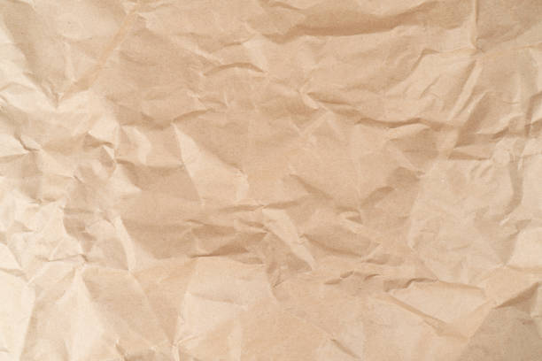 fondo marrón de papel arrugado. fondo de papel antiguo. superficie de papel vintage arrugado viejo. patrón de papel - paper craft brown wrinkled fotografías e imágenes de stock