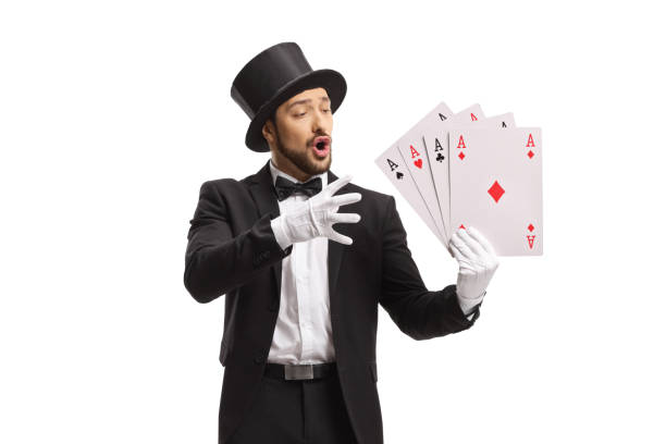 istock Magician performing a trick with cards 1383386638