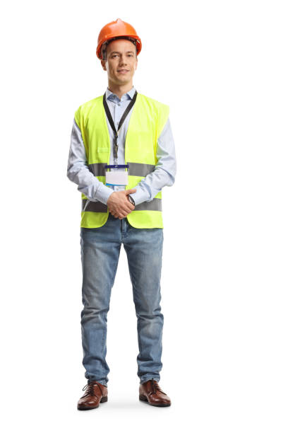 istock Male engineer with a safety vest and hardhat 1383386681