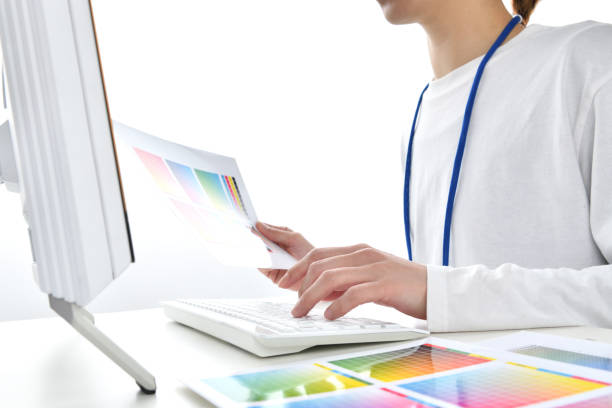 istock Business woman working with color chart in office 1383386897