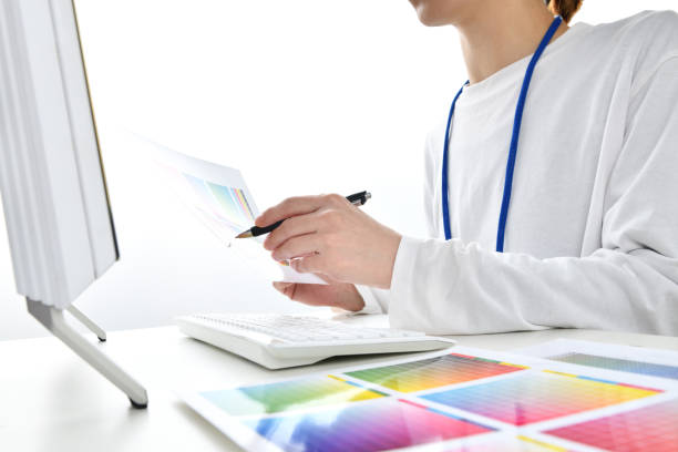 istock Business woman working with color chart in office 1383386911