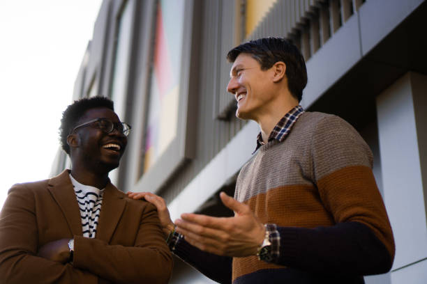 istock Two Casual businessmen talking outside 1383387169