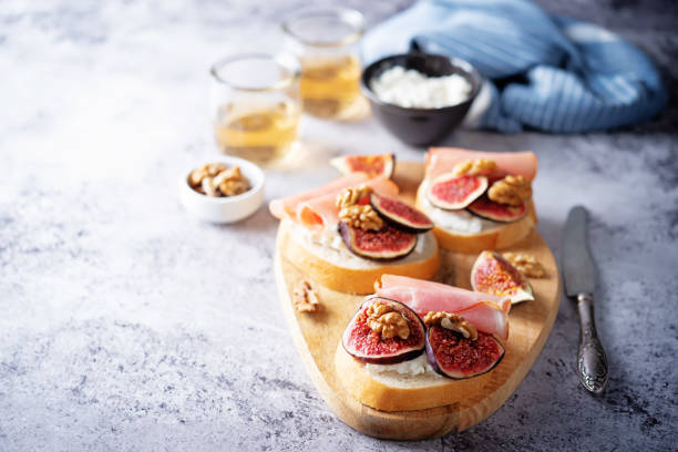 istock Figs ricotta prosciutto crostini with fresh figs and walnuts 1383388077