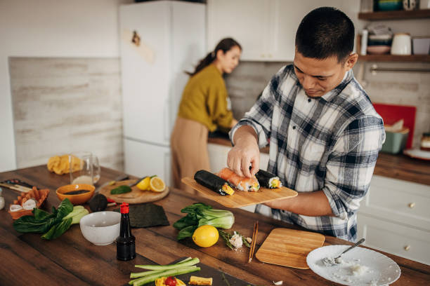 istock Couple prepared sushi for lunch 1383393403
