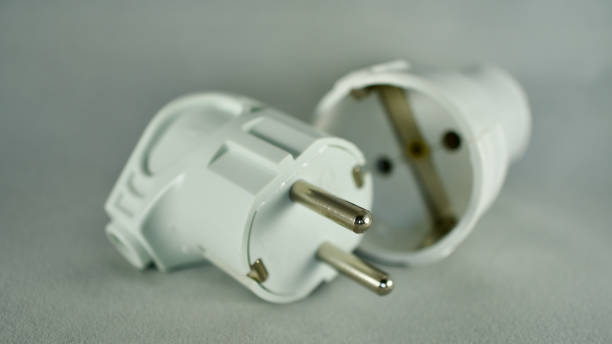 istock Male and female power plug. Wireless plug end. 1383395415
