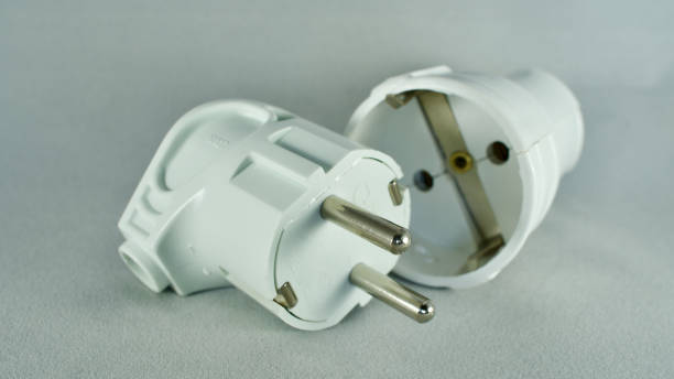 istock Male and female power plug. Wireless plug end. 1383396471
