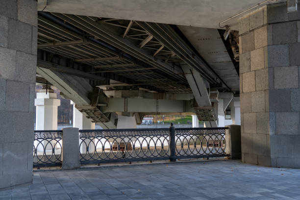 istock Framework under bridge. Metalwork. From the bottom of large bridge. Grey metal, modern design. Load-bearing metal structures of railway overpass 1383399949