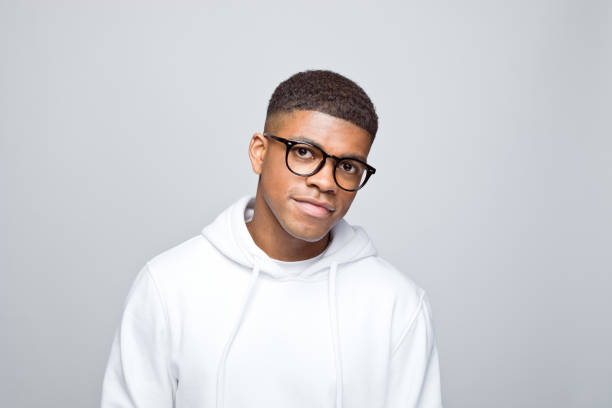 istock Headshot of handsome young man 1383408808