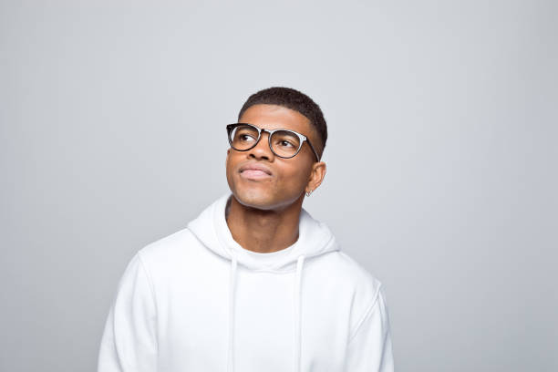 istock Headshot of thoughtful young man 1383409043
