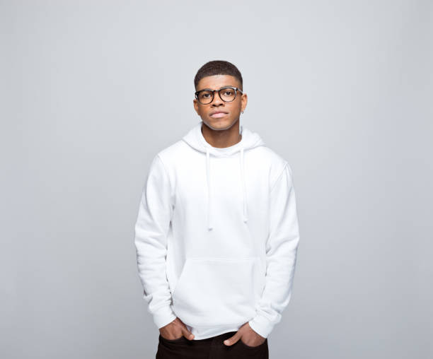 istock Portrait of confident young man 1383409153
