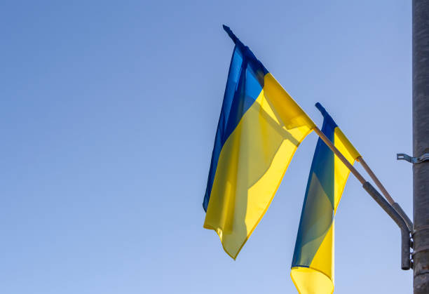 istock Ukrainian flags waving in the wind 1383410282