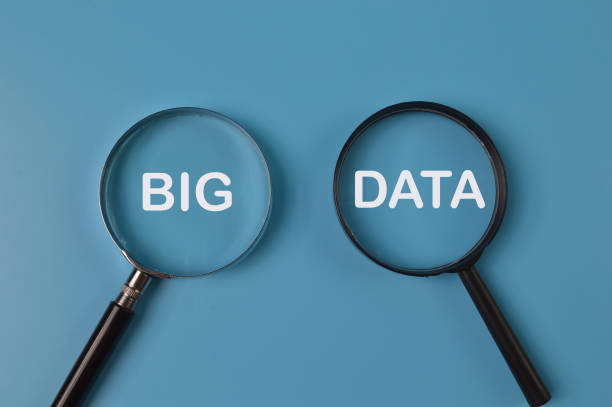 istock Top view of magnifying glass written with BIG DATA 1383417046