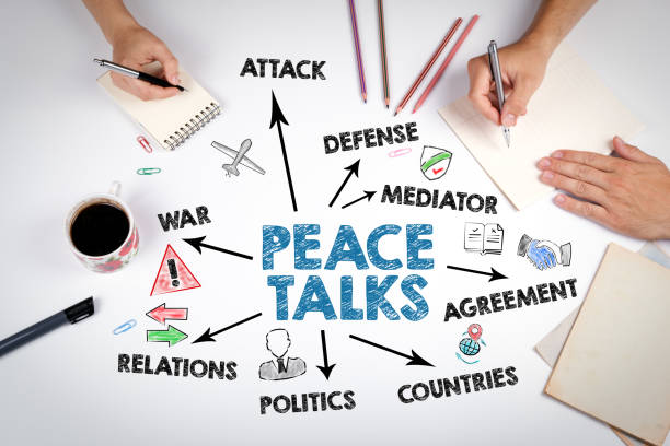 istock Peace talks Concept. The meeting at the white office table 1383424531