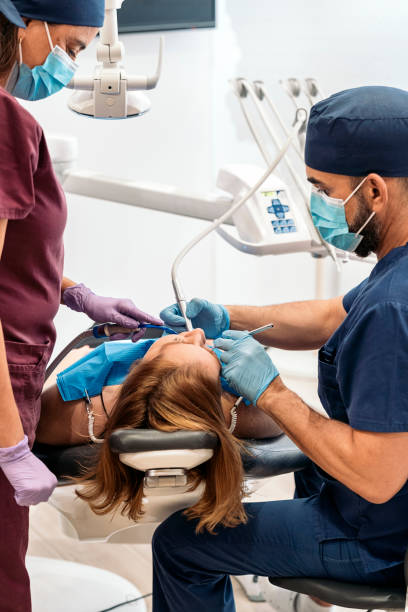 istock Young Girl Patient in Dentist 1383427257
