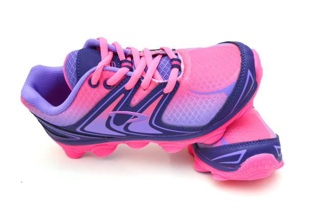 istock New unbranded running shoe, sneaker or trainer isolated on white 1383447023