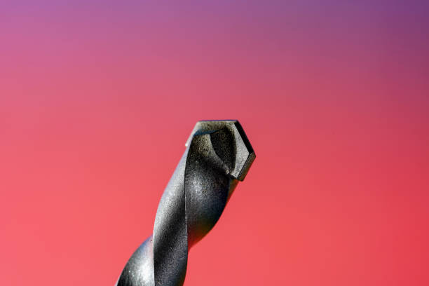 stone drill with point for drilling in natural stone and concrete photographed in the studio - drill bit fotos imagens e fotografias de stock