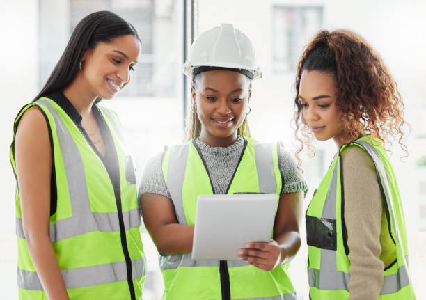 istock Shot of a group of architects using a digital tablet at work 1383464452