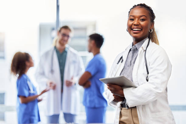 istock Shot of a young female doctor using a digital tablet at work 1383468427