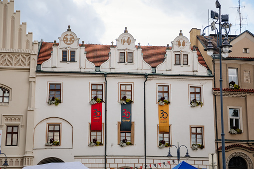 Tabor, South Bohemia, Czech Republic, 29 August 2021: Old Renaissance Town hall with clock tower and Hussitism museum on main square, Late gothic tracery gable on historical building, sunny summer day