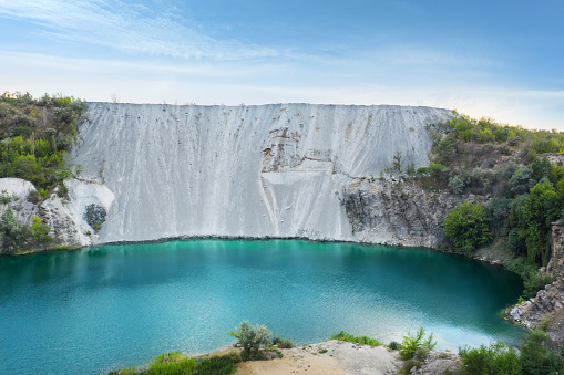 Picturesque aerial view on turquoise lake with granite banks