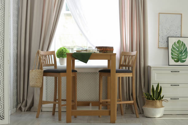 istock Beautiful curtains on window in stylish room interior 1383470523