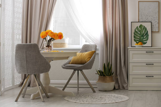 Beautiful curtains on window in stylish room interior Beautiful curtains on window in stylish room interior classic curtains stock pictures, royalty-free photos & images