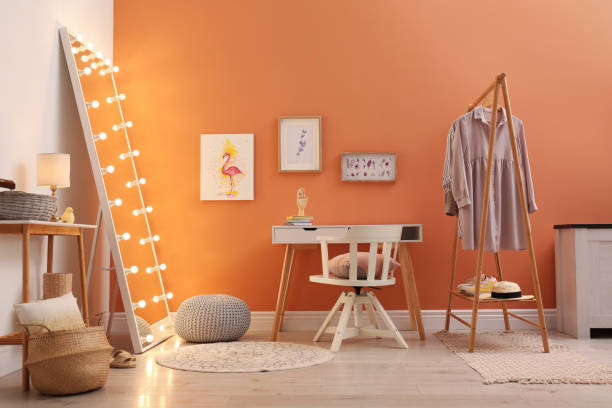 istock Trendy mirror with light bulbs in stylish room interior 1383471554