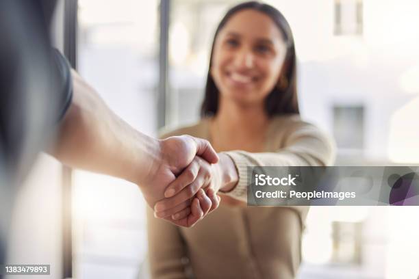 Shot Of Two Businesspeople Shaking Hands At Work Stock Photo - Download Image Now - Handshake, Interview - Event, Honesty