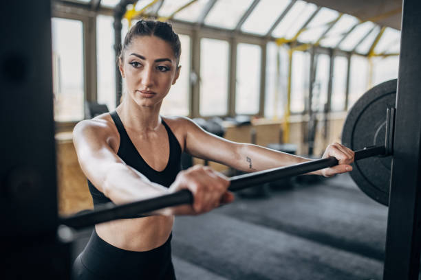 istock Fit woman weightlifting 1383481514