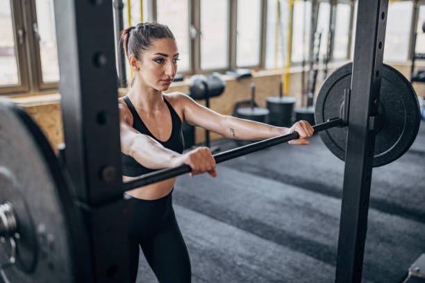 istock Fit woman weightlifting 1383481568