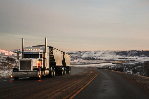 Trucking through the badlands of Alberta during winter