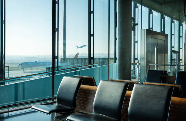 istock Airplane fly shortly after takeoff on a clear day 1383485142