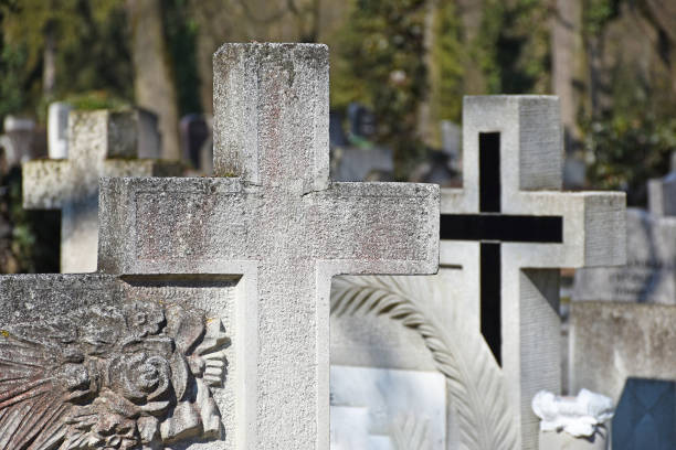 Old stone cross and light blue sky copy space simple abstract background, copy space. Old cemetery obelisk, Christianity, Catholicism symbols, faith concept, backdrop, wallpaper, nobody, no people