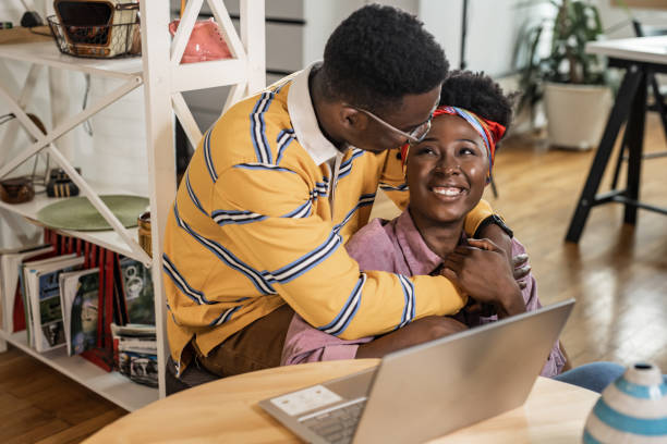 istock A young couple using laptop together 1383486862