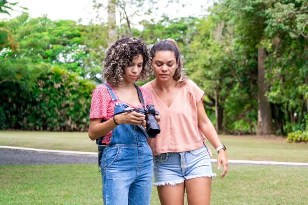 Young woman photographing.