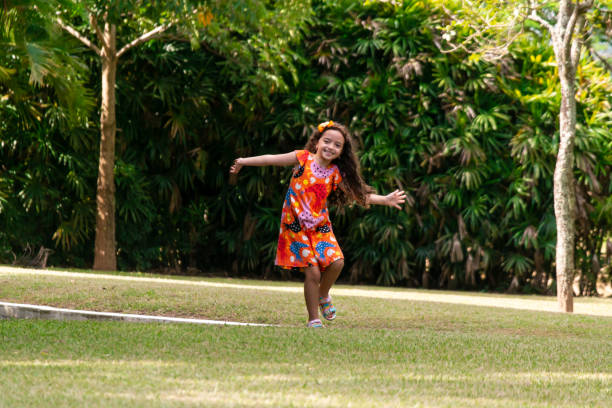 istock Little girl playing at a public park. 1383491236