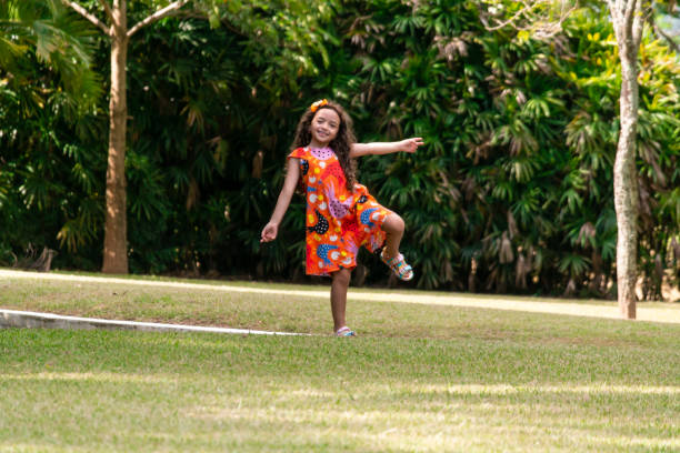 istock Little girl playing at a public park. 1383491639