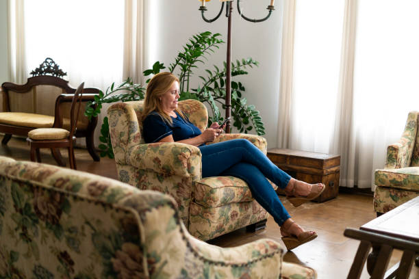 istock Woman at the house. 1383491720